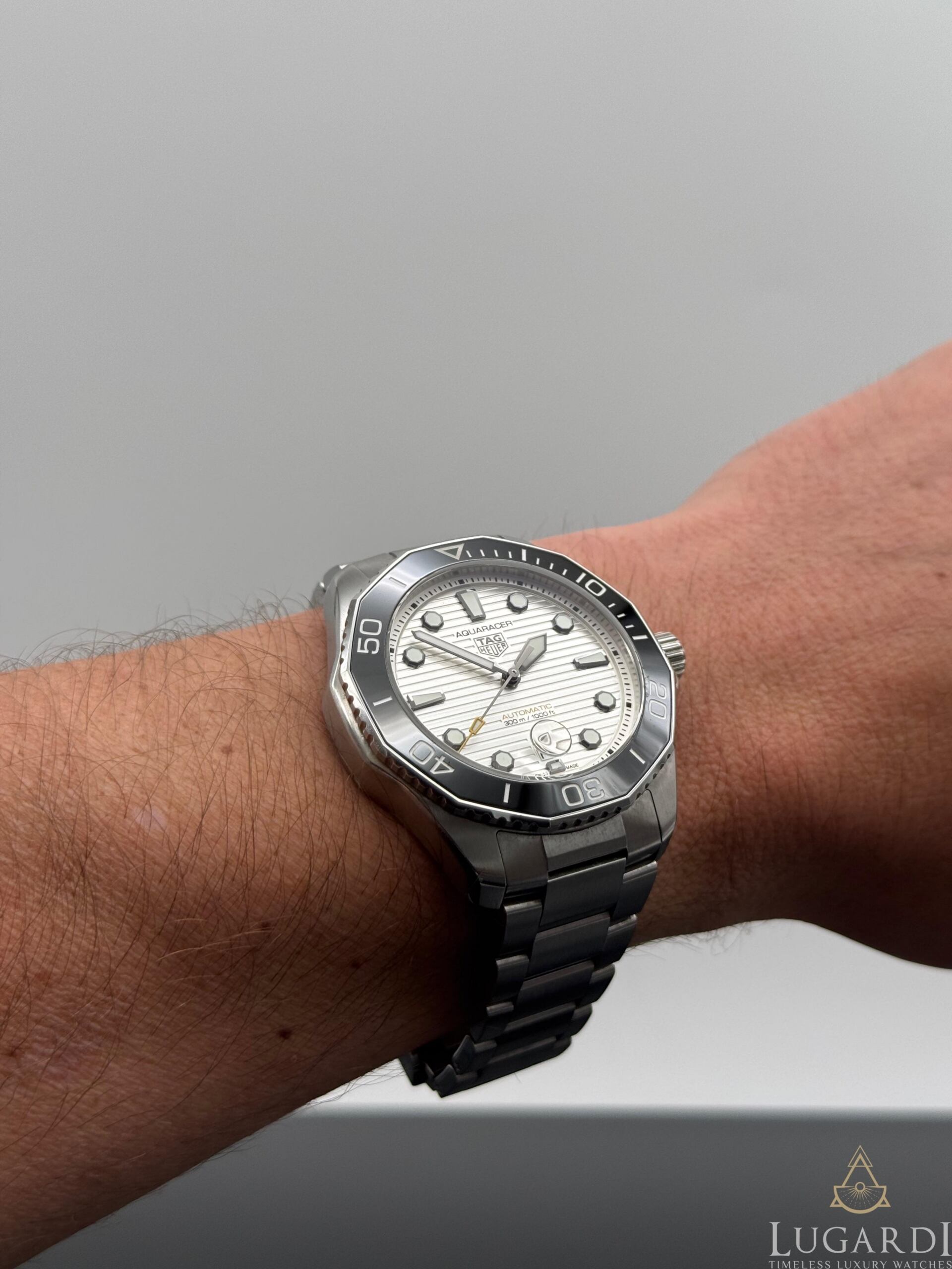 TAG Heuer Aquaracer WBC201C silver wave dial black ceramic bezel steel bracelet